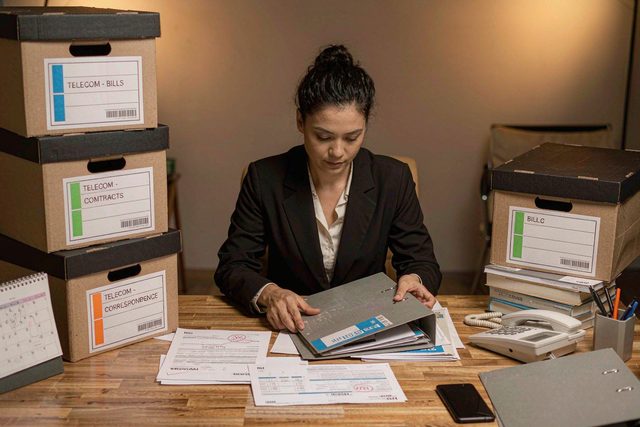 Home Auditor organising telecom contracts and billing folders